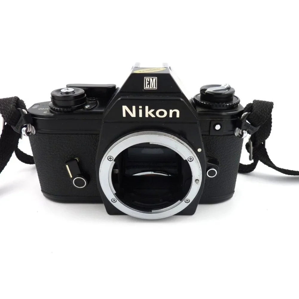 Nikon EM 35mm SLR Film Camera Body Only cam works light meter does not read